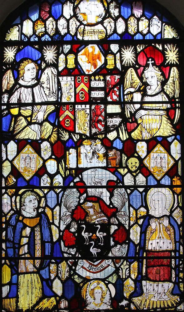 Medieval saints and angles in stained glass
